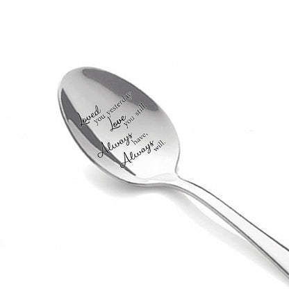 Stainless steel long-handled soup spoon